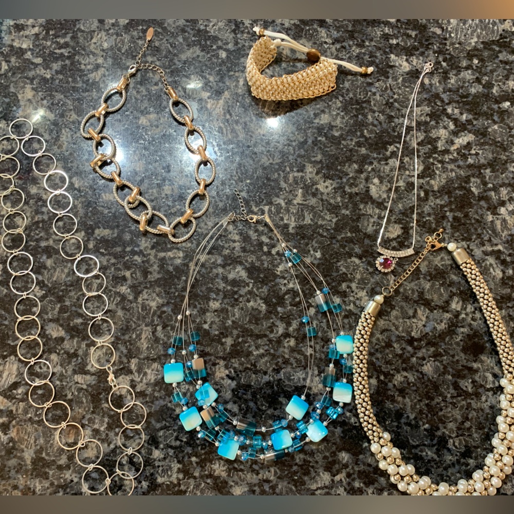 5 necklaces and a bracelet
